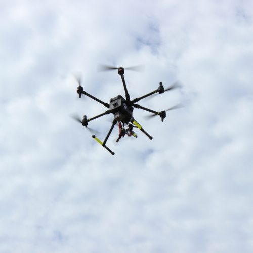 Powerful,Rescue,Drone,In,Action,Over,The,Beach,,Flying,To