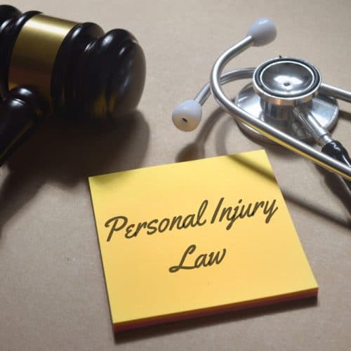 Top,View,Image,Of,Gavel,And,Stethoscope,With,Personal,Injury