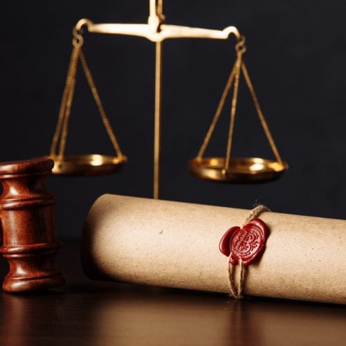 Wooden,Gavel,And,Scales,Near,Testament,And,Last,Will.,Notary