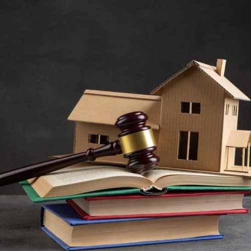 House,Model,,Gavel,And,Books,On,The,Desk,,Real,Property
