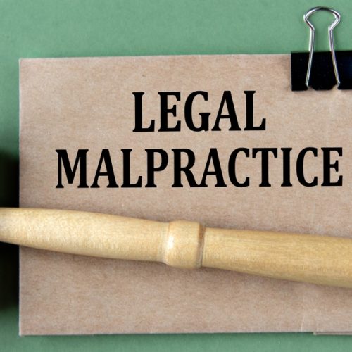 Legal,Malpractice, ,Words,On,Brown,Paper,On,A,Green