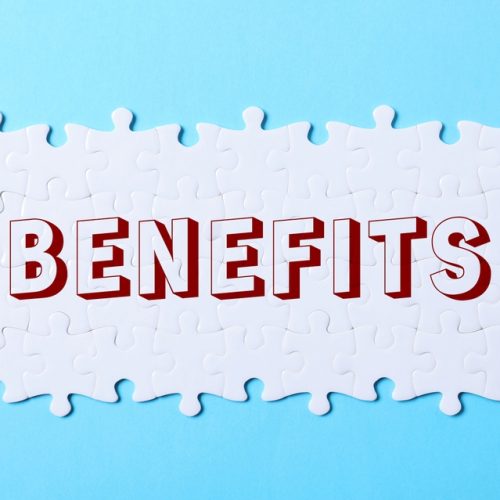 White,Jigsaw,Puzzle,Pieces,With,Word,Benefits,On,Light,Blue