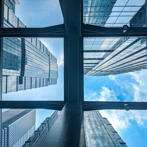 Viewing,High rise,Buildings,Through,A,Glass,Ceiling,From,A,Low