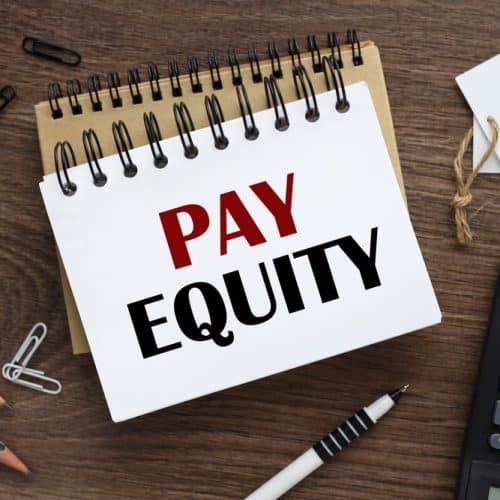 Pay,Equity.,Two,Notepads,And,A,Calculator.,Text,On,White