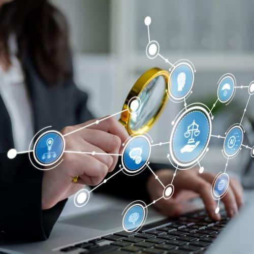 A,Woman,Examines,Legal,Icons,With,A,Magnifying,Glass,While