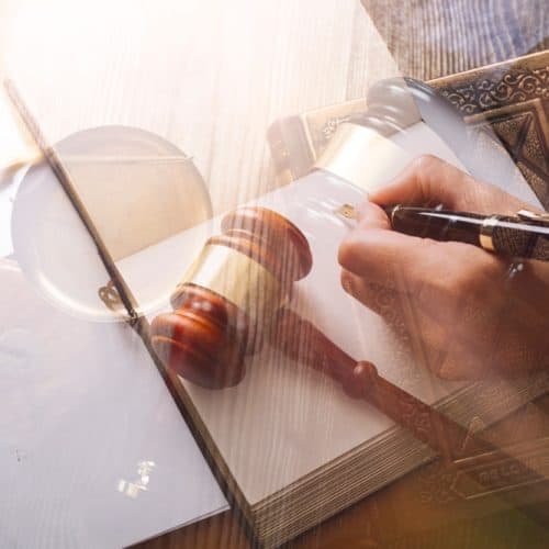 Male,Lawyer,Working,With,Contract,Papers,And,Wooden,Gavel,On