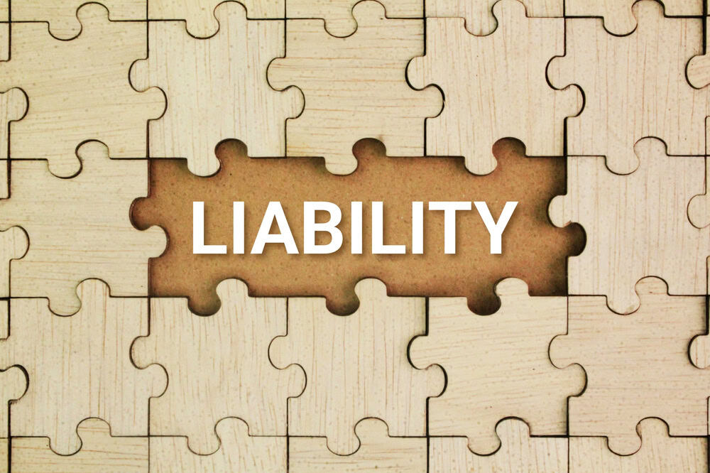 Wooden,Puzzle,With,The,Word,Liability.,The,State,Of,Being