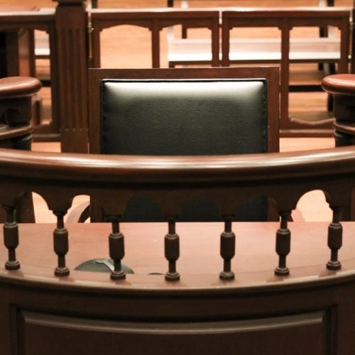 A,Witness,Stand,With,A,Black,Seat,In,The,Court