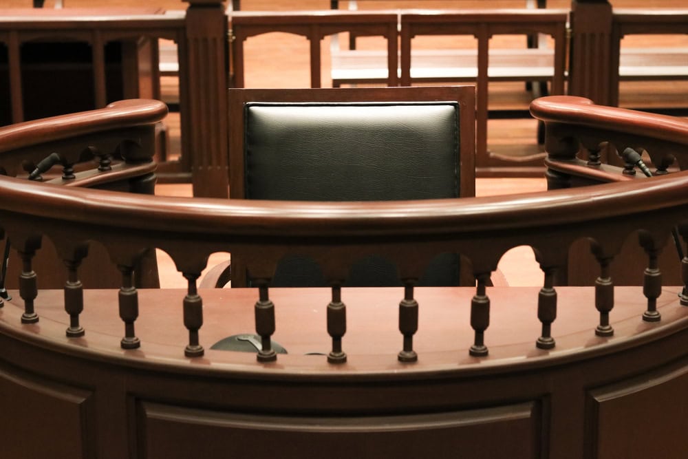 A,Witness,Stand,With,A,Black,Seat,In,The,Court