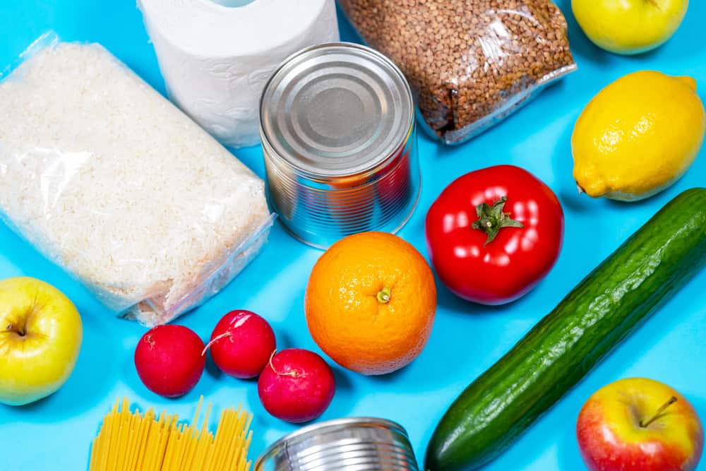 Products,On,A,Blue,Background,,Top,View.,Vegetables,,Pasta,,Canned