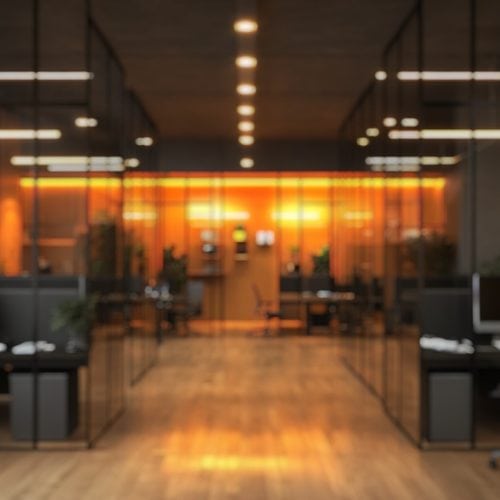 A,Contemporary,Coworking,Space,Featuring,Modular,Black,Desks,And,Ergonomic
