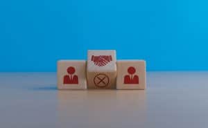 Merger,,Collaboration,,Businessmen,Shaking,Hands,To,Make,A,Deal