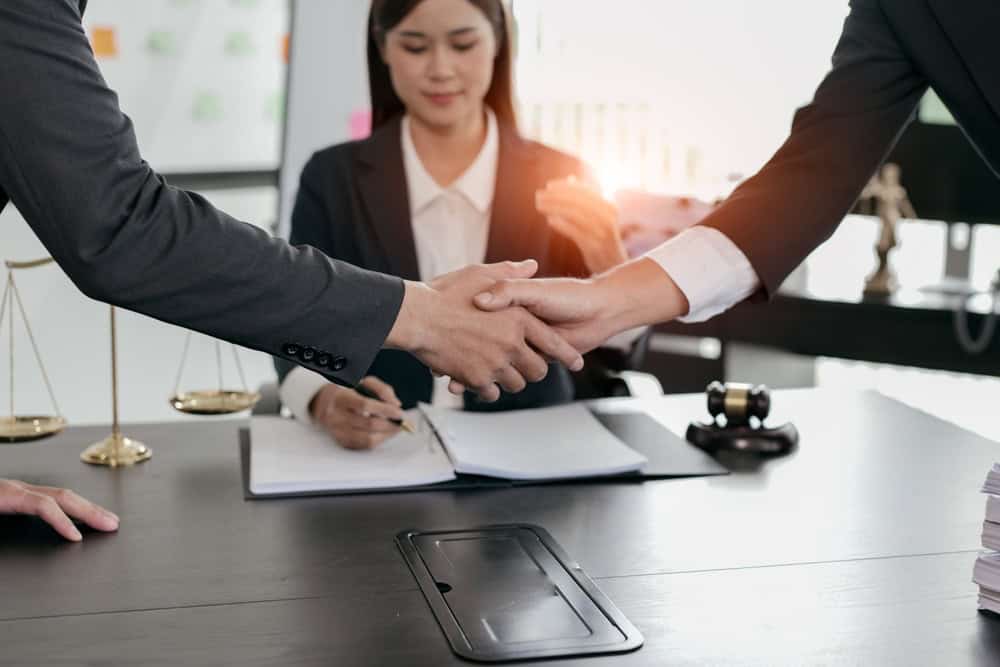 Handshake,After,Good,Cooperation,,Consultation,Between,A,Male,Lawyer,And