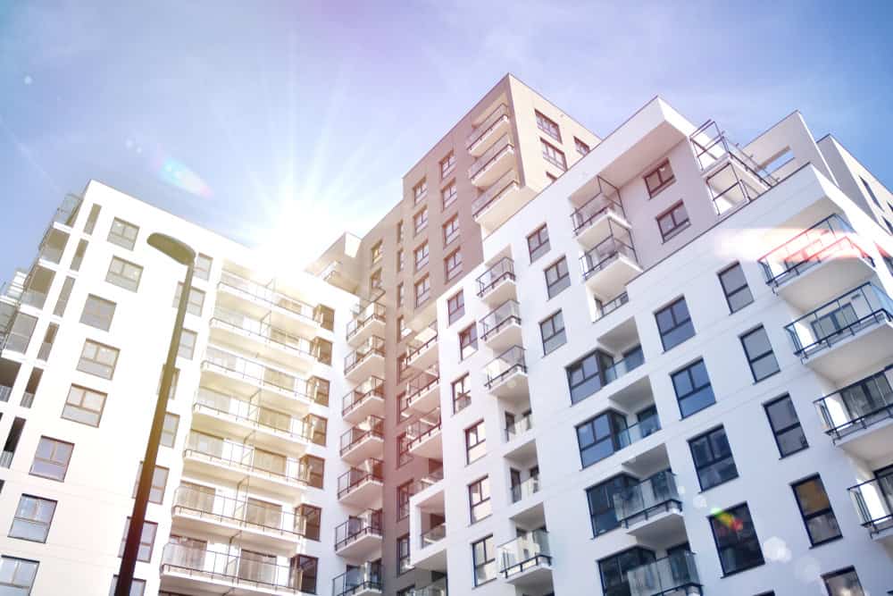 Modern,Apartment,Buildings,On,A,Sunny,Day,With,A,Blue