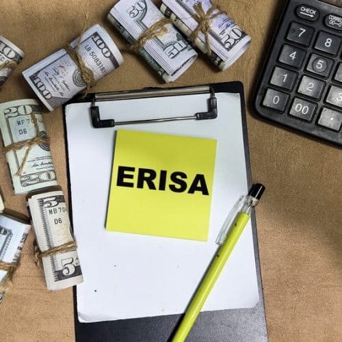 Concept,Of,Erisa,Write,On,Sticky,Notes,Isolated,On,Wooden
