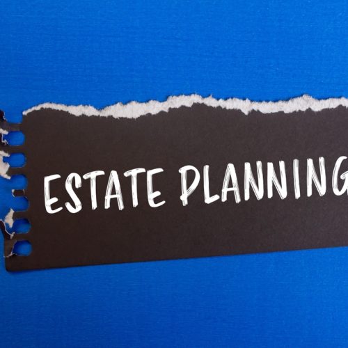 Estate,Planning,Message,Written,On,Ripped,Black,Paper,Piece,With