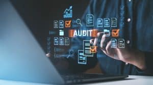 Person,Interacts,With,Digital,Audit,Interface,,Features,Checklists,And,Documents,