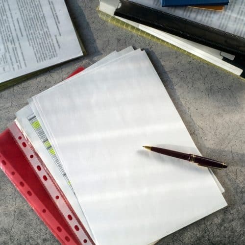 Documents,In,Folders,,Blank,Sheets,Of,Paper,,A,Pen,Are