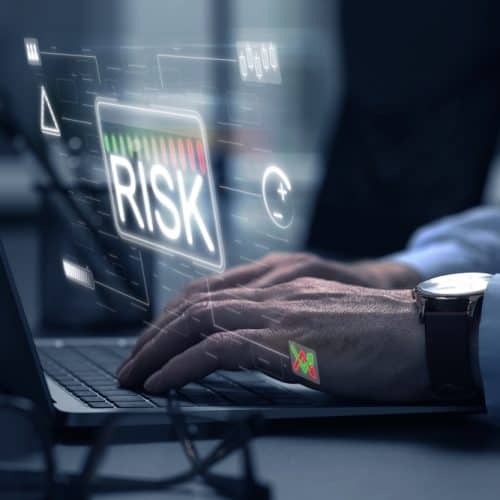 Businessman,Using,Laptop,,Closeup.,Scheme,With,Word,Risk,And,Different