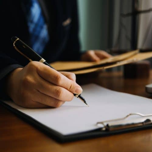 Business,And,Lawyers,Discussing,Contract,Papers,With,Brass,Scale,On